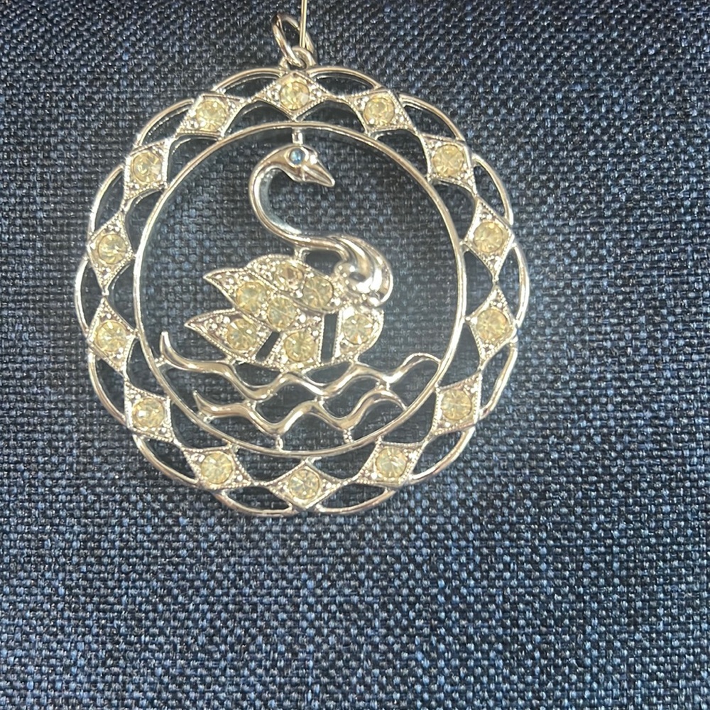 Vintage Swan pendant with Rhinestone no chain available the eye has a blue Stone